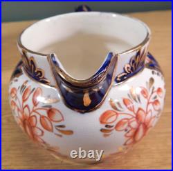 2 Antique Or Vintage Gaudy English Pitchers And A Small Tray