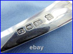 A Vintage Pair Of Sterling Silver Old English Dessert Spoons. London 1938