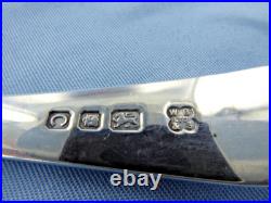 A Vintage Pair Of Sterling Silver Old English Dessert Spoons. London 1938