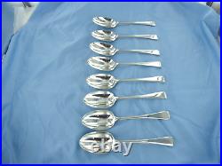 A Vintage Sterling Set Of Eight Silver Old English Serving Spoons. London 1939