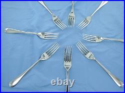 A vintage set of eight sterling silver old English dinner forks. London 1939