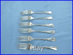 A vintage set of six sterling silver old English dinner forks. London 1936