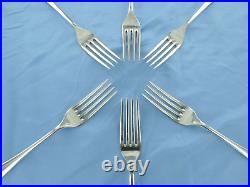 A vintage set of six sterling silver old English dinner forks. London 1936