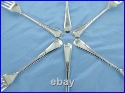 A vintage set of six sterling silver old English dinner forks. London 1936