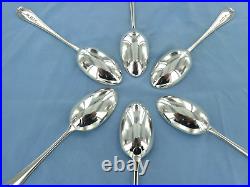 A vintage sterling silver set of 6 old English dessert spoons, London 1939