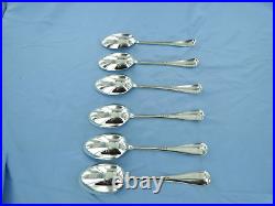 A vintage sterling silver set of six old English dessert spoons, Birmingham 1931