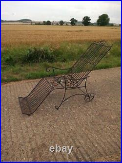 An Original, Vintage, Mid Century Cast Iron Sun Lounger With Signs Of Age & Wear