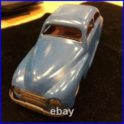 Antique English tin spring-loaded automobile, vintage