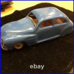 Antique English tin spring-loaded automobile, vintage