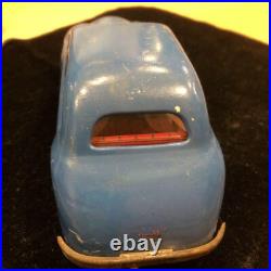 Antique English tin spring-loaded automobile, vintage
