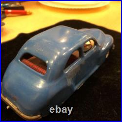 Antique English tin spring-loaded automobile, vintage
