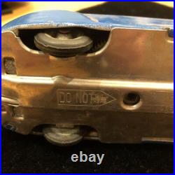 Antique English tin spring-loaded automobile, vintage