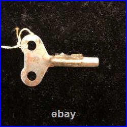 Antique English tin spring-loaded automobile, vintage