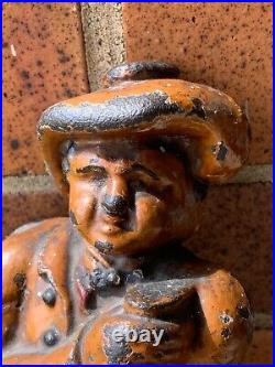 English Antique Vintage Cast Iron Man in Chair Hoisting Ale Mug Doorstop