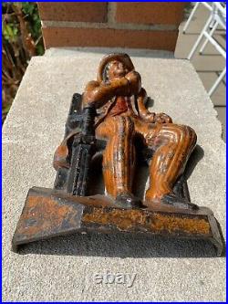 English Antique Vintage Cast Iron Man in Chair Hoisting Ale Mug Doorstop