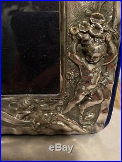 English Vintage High relief Cherub picture frame Sterling Silver. Holds 5x31/2