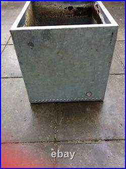 Galvanised riveted vintage water tank could be used as planter or water feature
