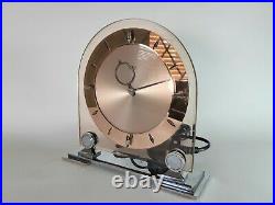 Large Smiths English 1930s pink glass and mirror electric mantle clock