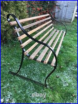 Lovely English Vintage metal and oak garden bench in fabulous condition