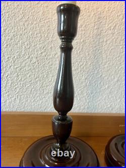 Pair of antique vintage English mahogany art nouveau turned candlesticks