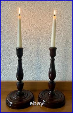 Pair of antique vintage English mahogany art nouveau turned candlesticks