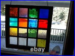 Stained glass in Vintage window. 26 x 25