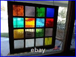 Stained glass in Vintage window. 26 x 25