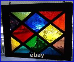 Stained glass in vintage diamond window
