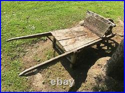 Vintage wooden wheelbarrow